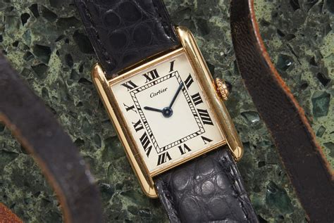 cartier tank wrist watch.